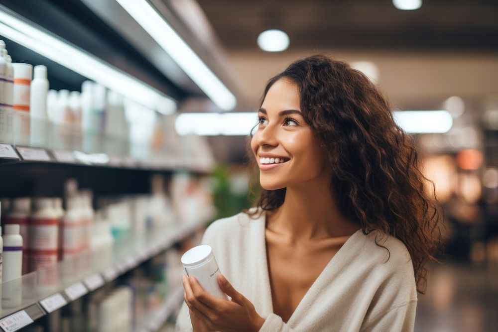 Woman reading ingredients shopping smile adult. 