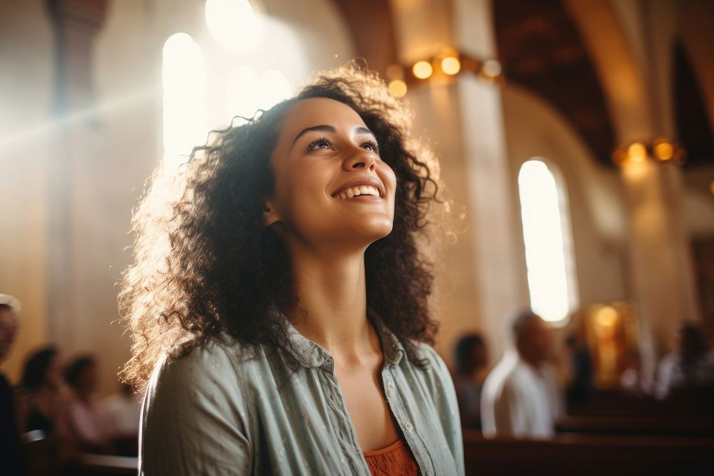 Happy woman talking to god at church smile adult spirituality. AI generated Image by rawpixel.