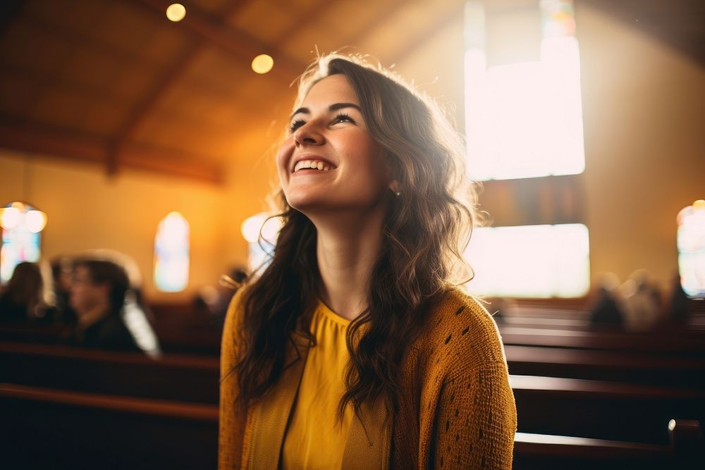 Happy woman talking to god at church adult smile spirituality. AI generated Image by rawpixel.