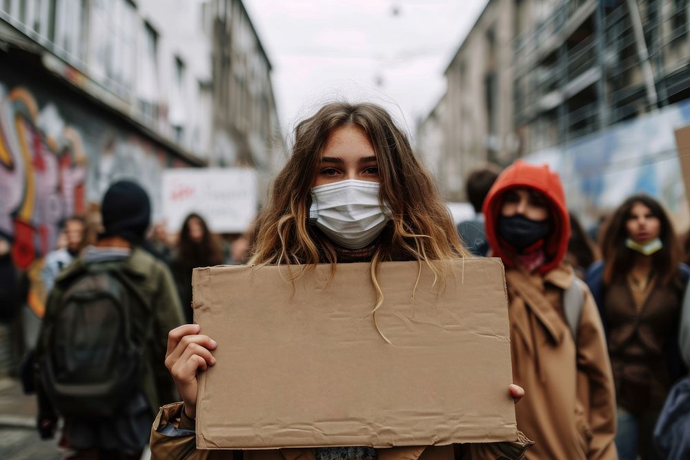 Teenager protest pollution adult. AI generated Image by rawpixel.