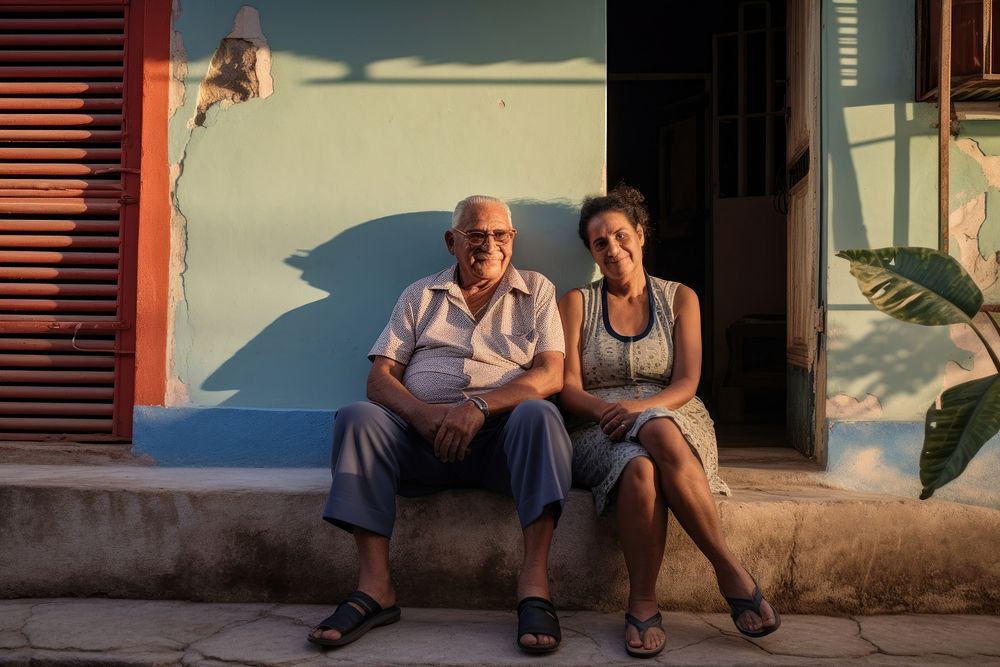 Hispanic elderly couple footwear sitting glasses. AI generated Image by rawpixel.