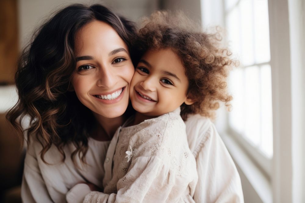 Hispanic mom hugging a kid adult smile love. AI generated Image by rawpixel.