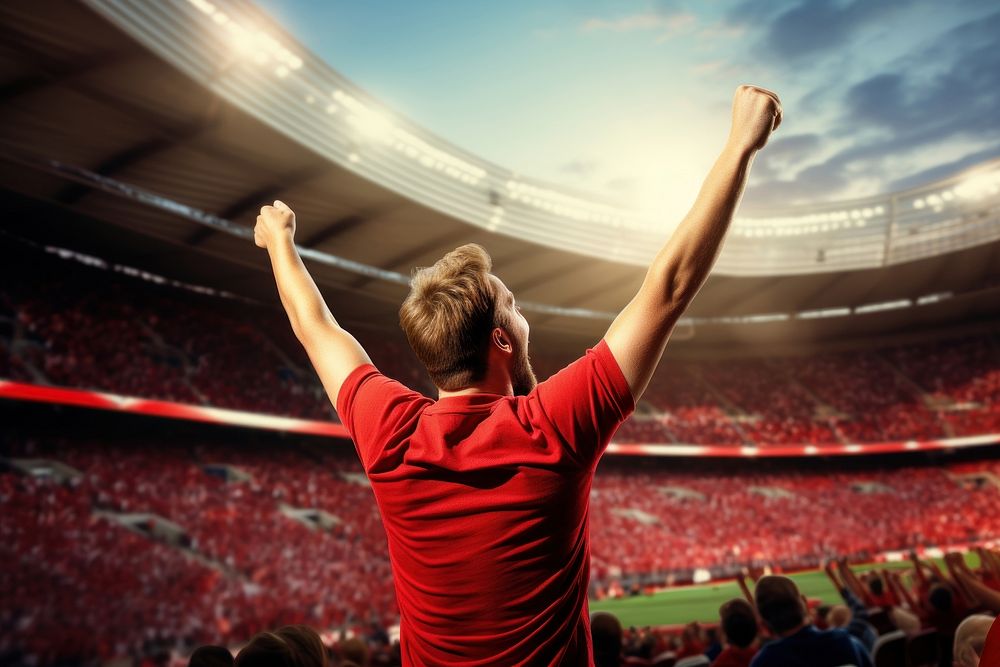 Latinix man cheering football game in stadium sports performance competition. AI generated Image by rawpixel.