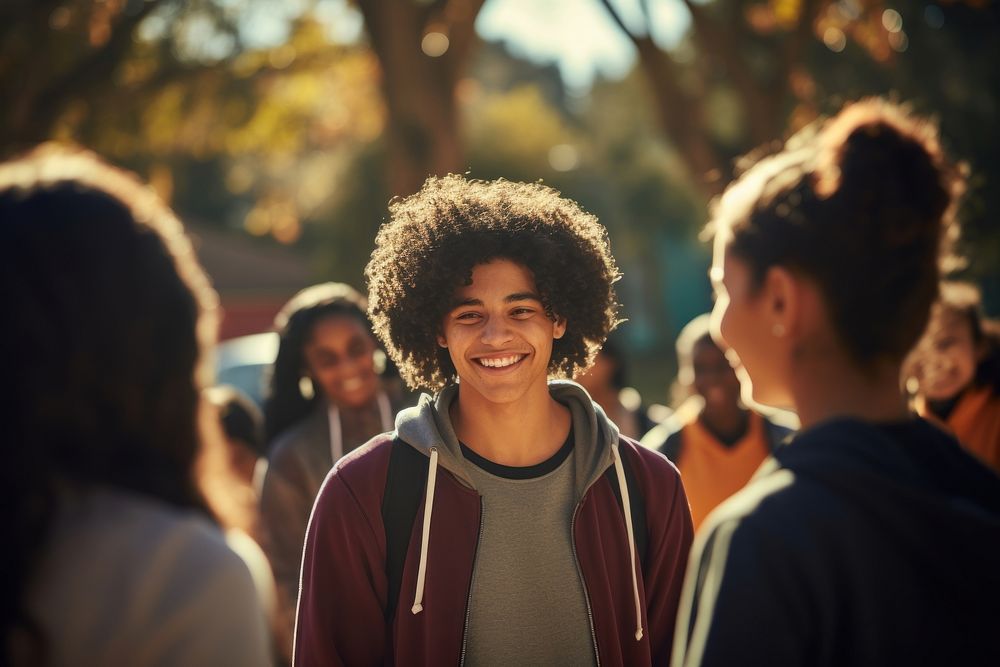 Latinx students gathering before basketball game adult smile togetherness. AI generated Image by rawpixel.