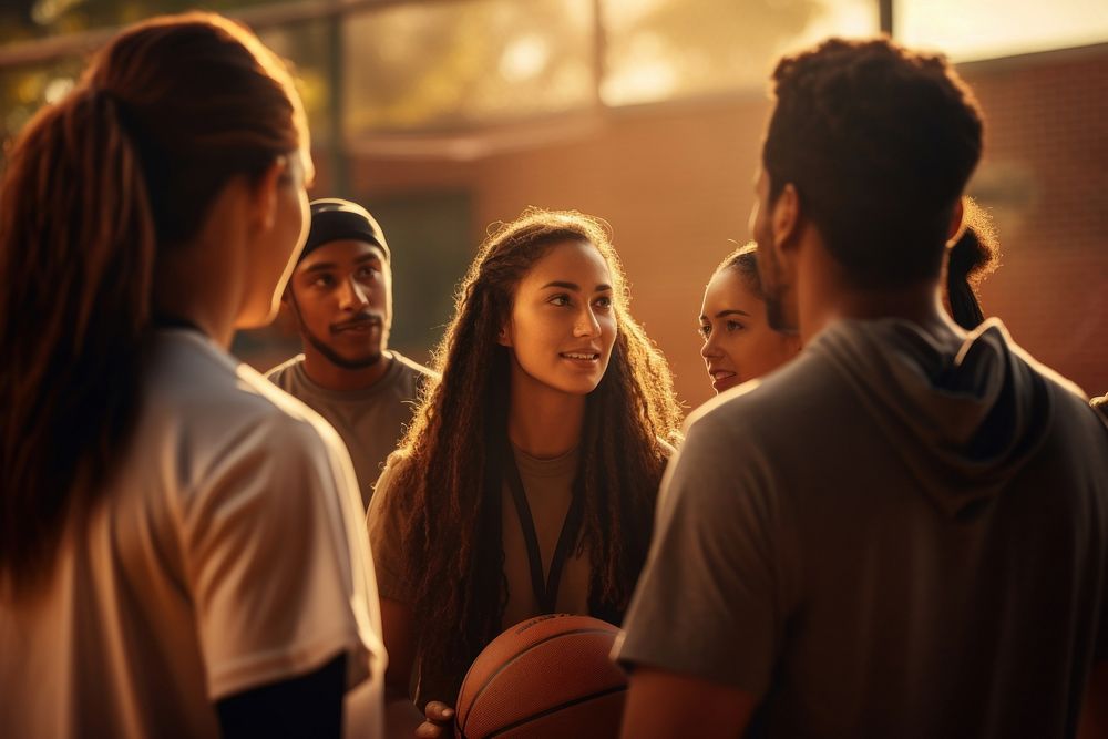 Latinx students gathering before basketball game sports adult togetherness. AI generated Image by rawpixel.
