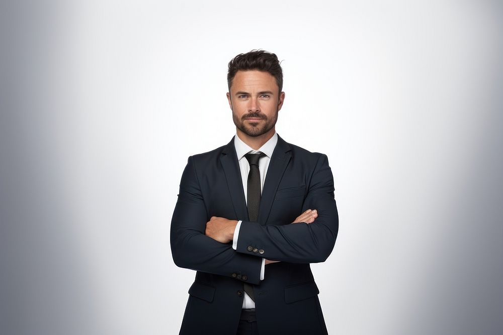A confident business man crossing arms portrait adult photo. AI generated Image by rawpixel.