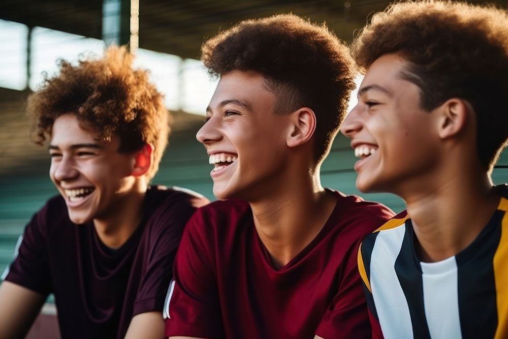 Latin teenagers football team cheerful laughing togetherness. AI generated Image by rawpixel.