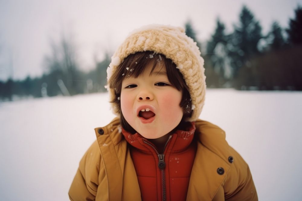 A kid in the snow photography portrait outdoors. AI generated Image by rawpixel.