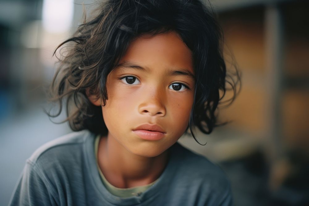 A little asian black kid photography portrait child. AI generated Image by rawpixel.