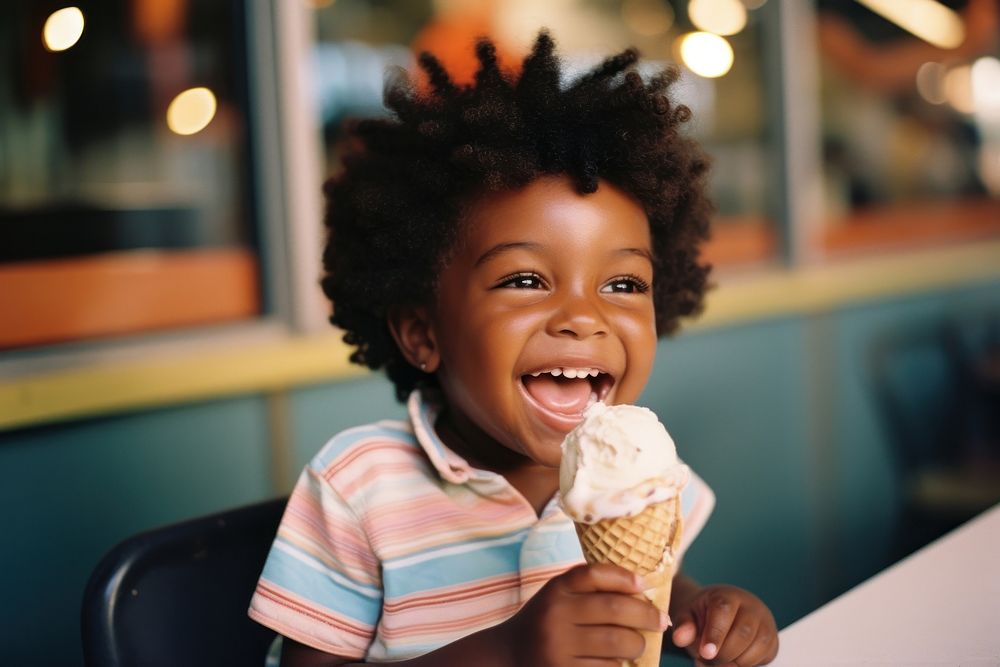 A little black kid eating ice-cream dessert smile child. AI generated Image by rawpixel.