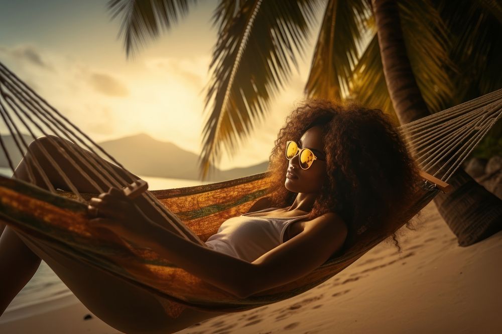 A black woman sleeping in a hammock under the coconut tree on the beach vacation adult sun. AI generated Image by rawpixel.