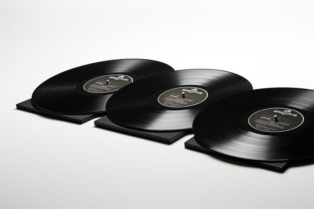 Black records white background gramophone technology. AI generated Image by rawpixel.