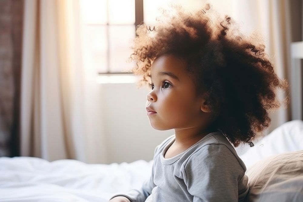 Black baby girl bedroom child contemplation. AI generated Image by rawpixel.