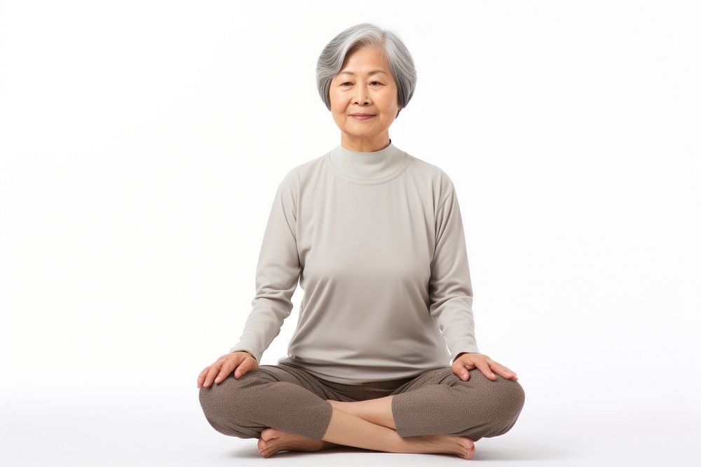 Asian senior woman doing yoga meditation sitting sports adult. AI generated Image by rawpixel.