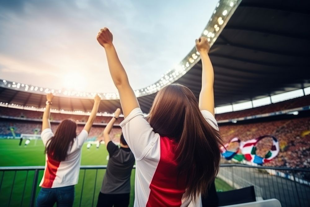 Soccer fans are cheering for sport stadium sports togetherness. AI generated Image by rawpixel.
