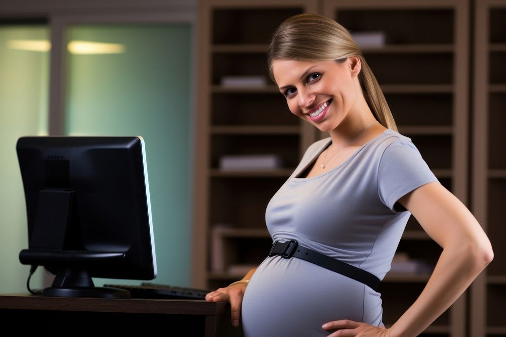 Pregnant business woman furniture computer smiling. AI generated Image by rawpixel.