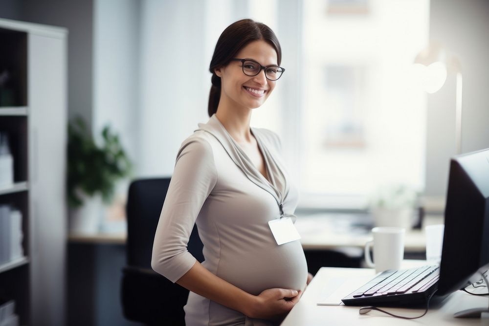 Pregnant business woman computer smiling working. AI generated Image by rawpixel.