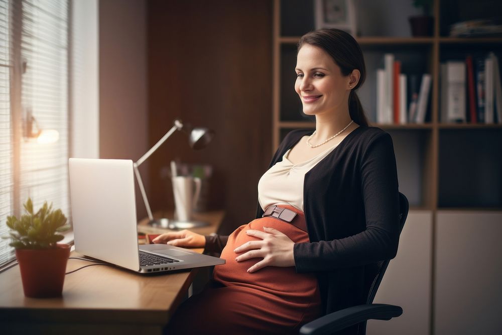 Pregnant business woman computer furniture sitting. AI generated Image by rawpixel.