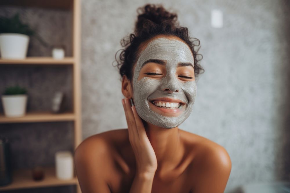 Applying face mask smiling adult woman. AI generated Image by rawpixel.