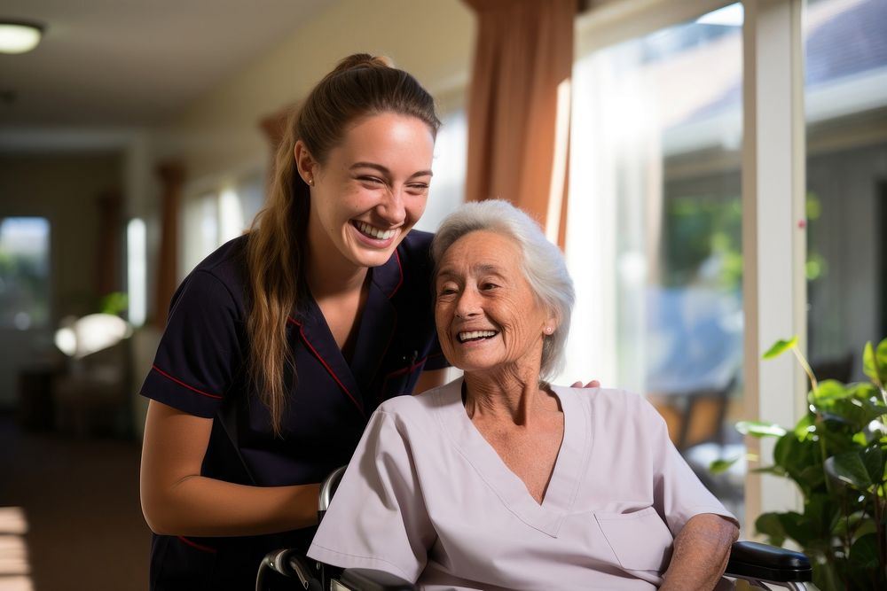 Senior nursing home nurse wheelchair smiling. AI generated Image by rawpixel.