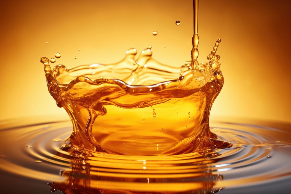 Honey liquid floating refreshment concentric simplicity. AI generated Image by rawpixel.