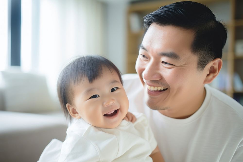 Asian family laughing portrait child. AI generated Image by rawpixel.