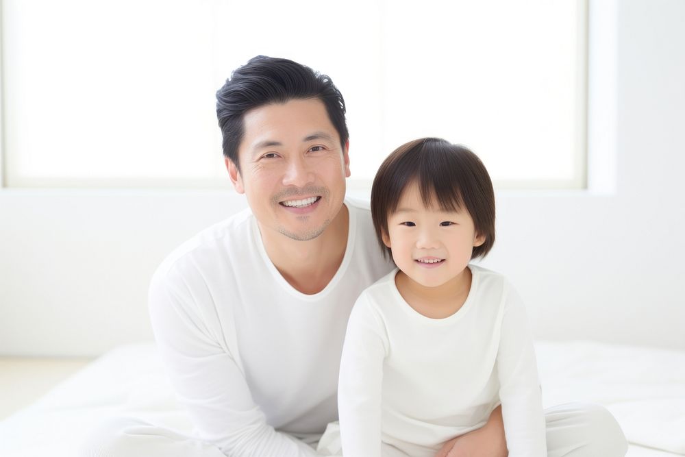 Asian family sitting child adult. AI generated Image by rawpixel.