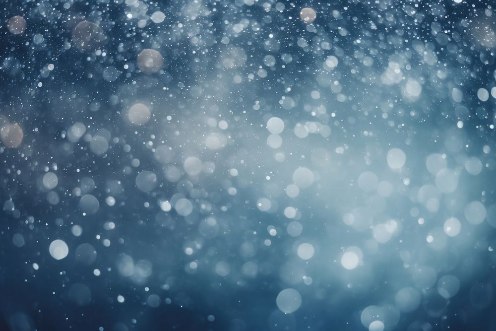 Bokeh snowfall backgrounds abstract outdoors. AI generated Image by rawpixel.