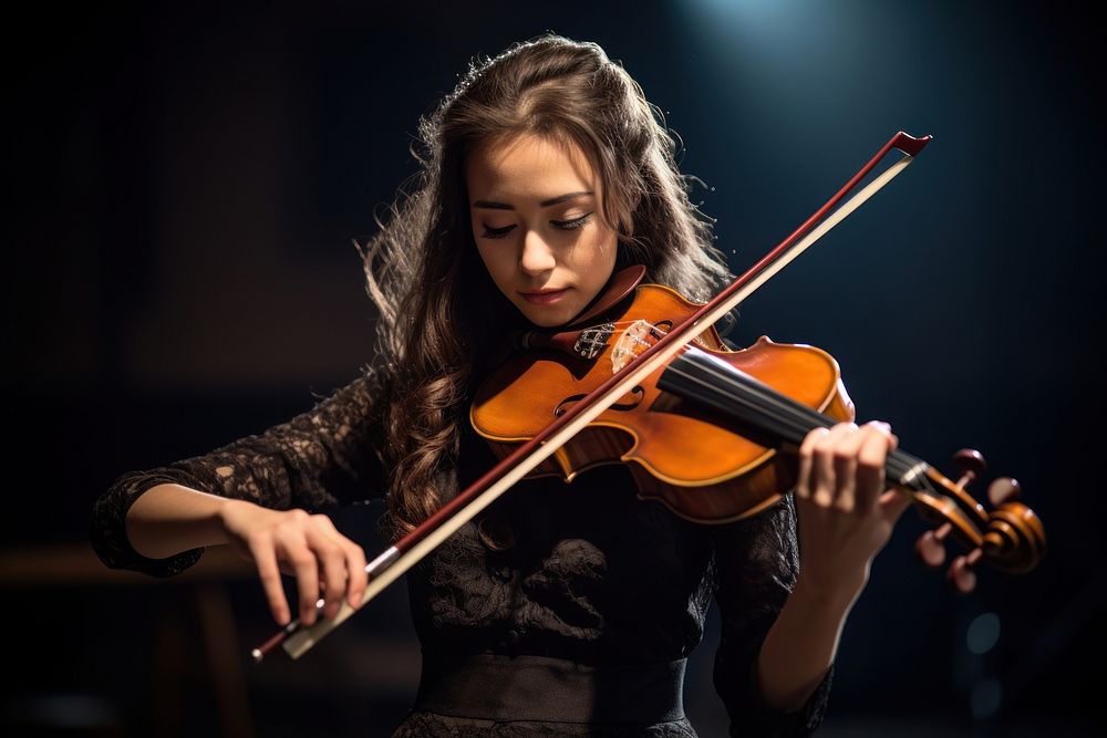 Female student playing violin musician concentration entertainment. AI generated Image by rawpixel.