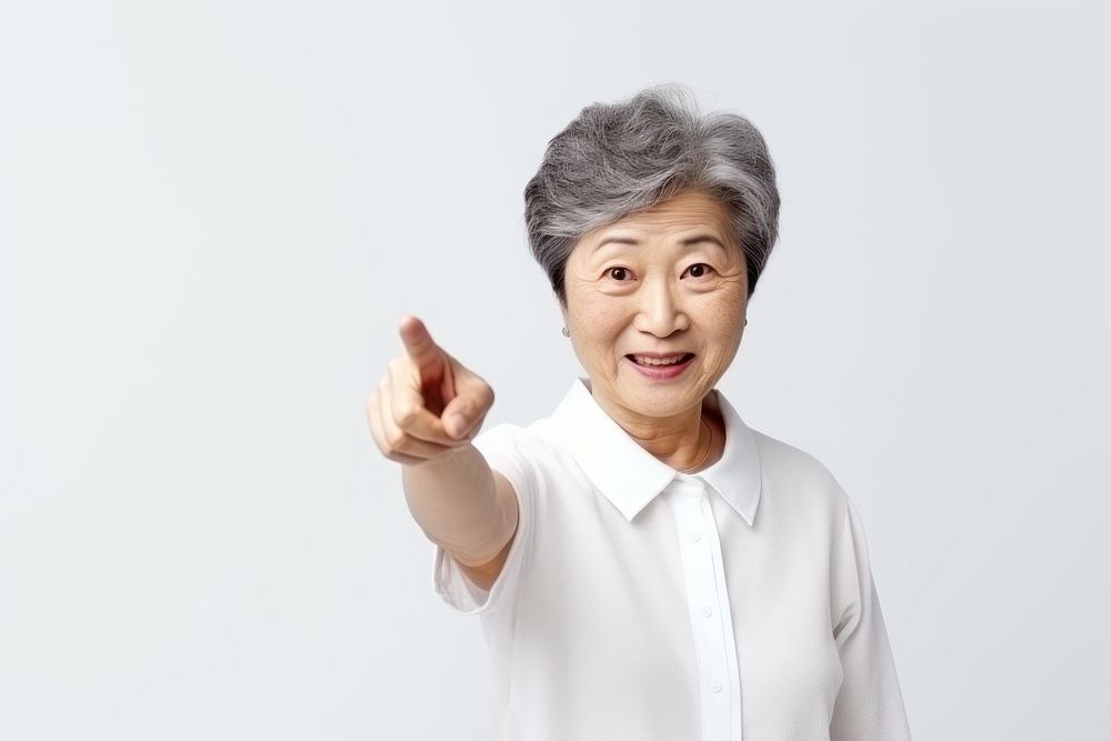 A confident asian old woman adult white background copy space. AI generated Image by rawpixel.