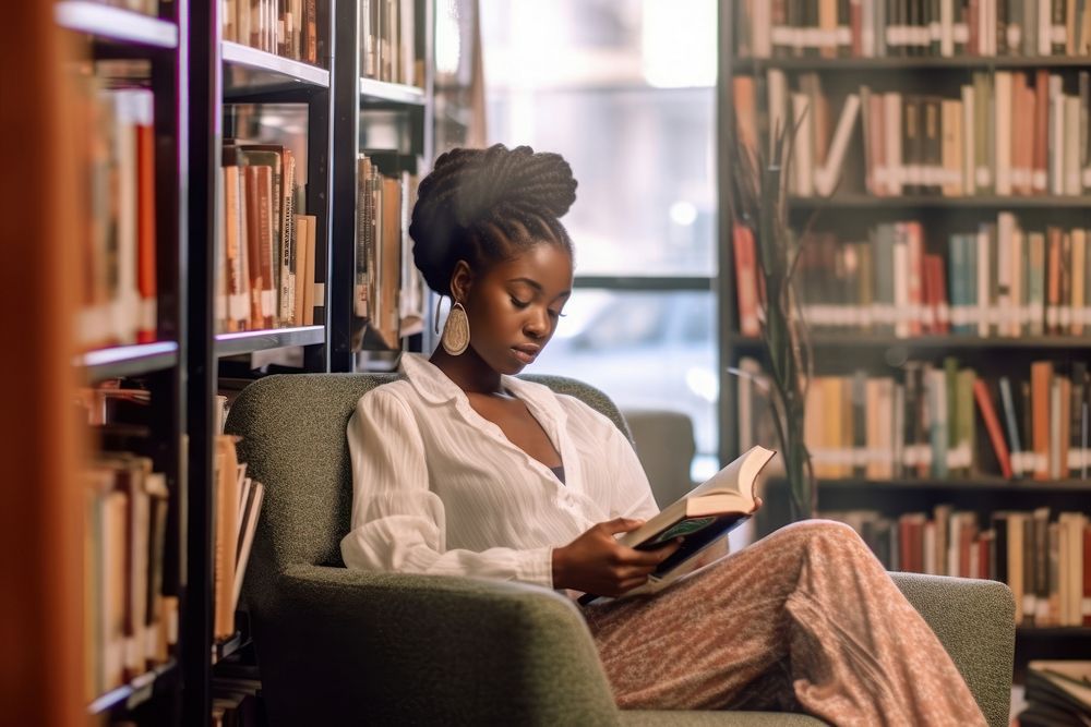 American african woman teenage college reading library book. 