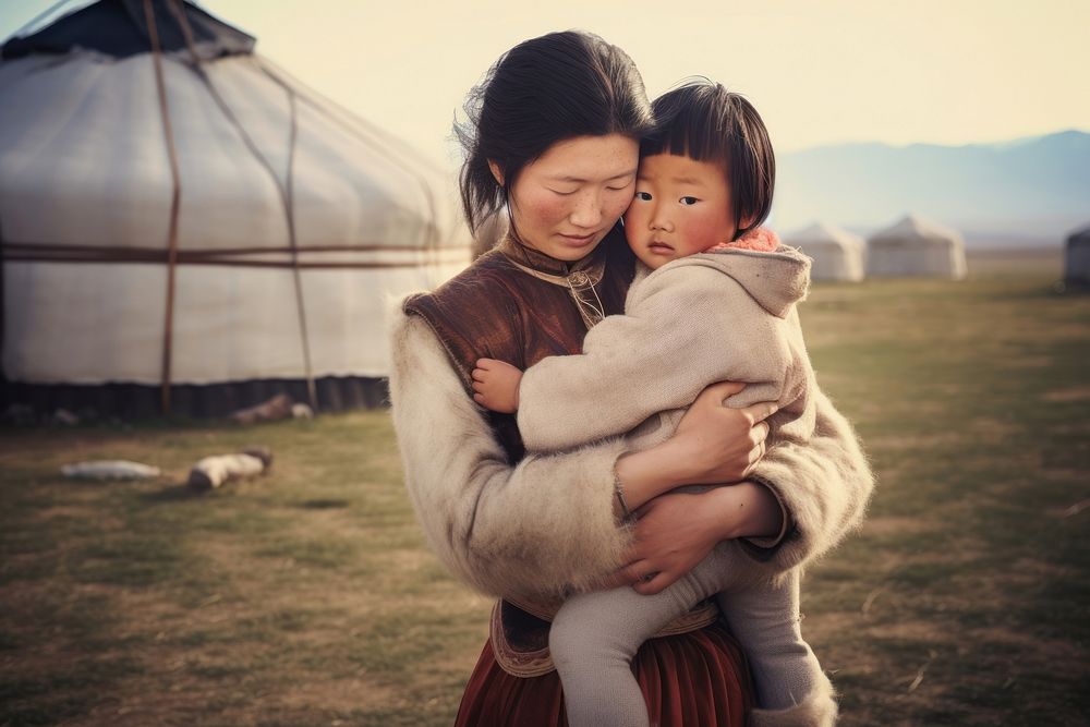 Mongolian woman holding and daughter hugging cheep in the style lomo filter architecture outdoors portrait. AI generated…