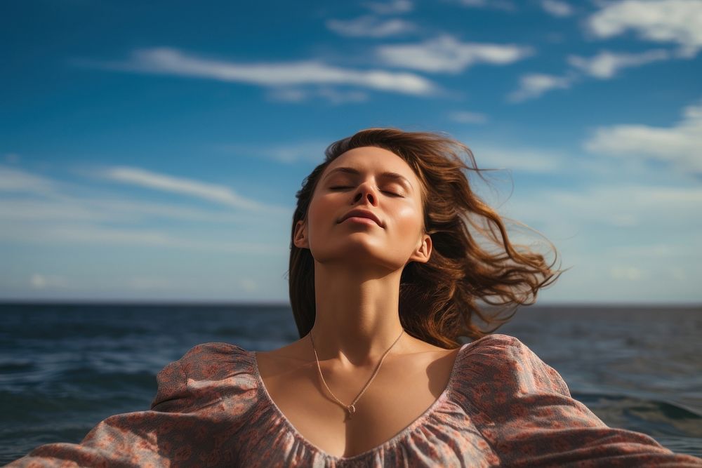 Relaxed woman enjoying the sea portrait adult contemplation. AI generated Image by rawpixel.