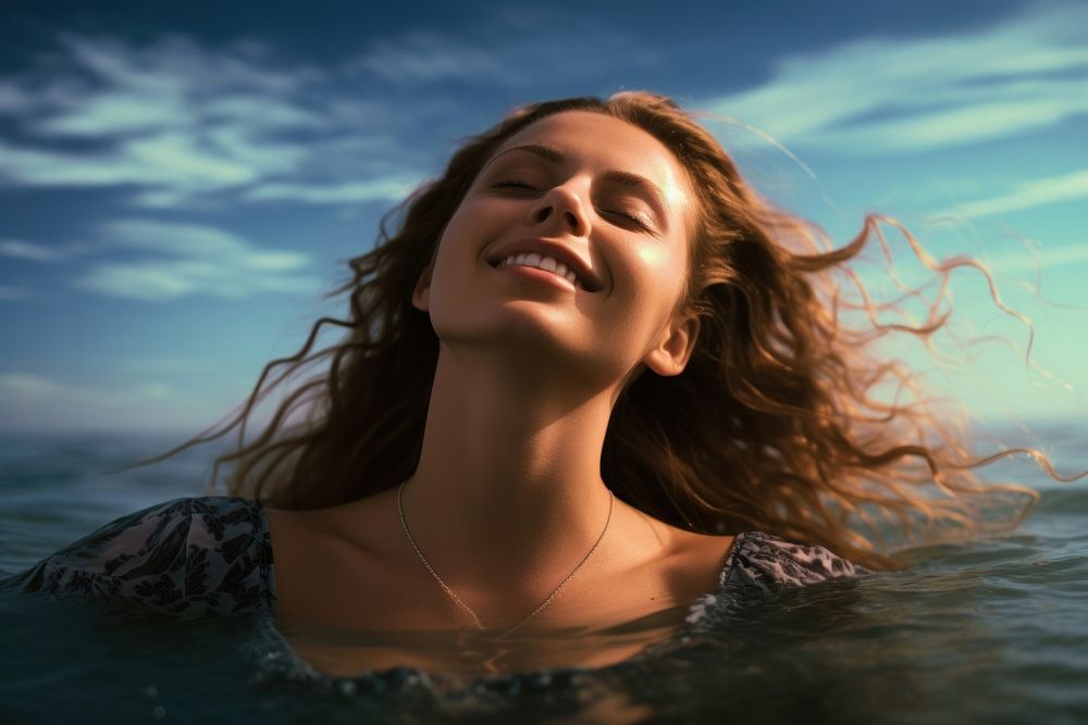 Relaxed woman enjoying the sea swimming portrait adult. AI generated Image by rawpixel.