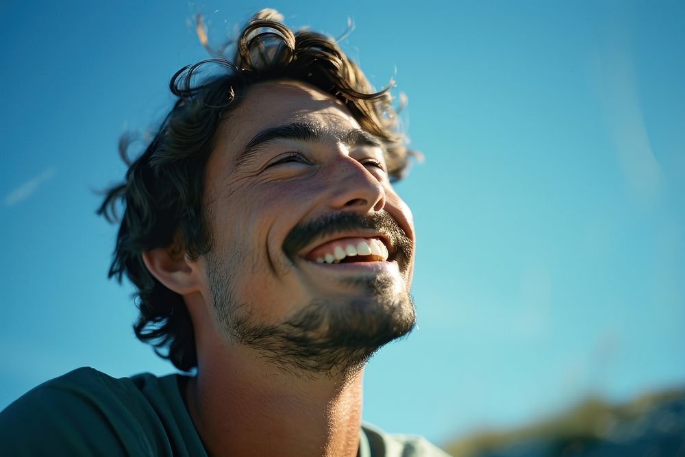 Smiling man laughs outside laughing motion smile. AI generated Image by rawpixel.