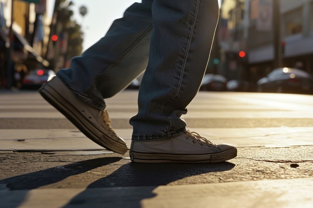 Man walking shoe footwear sneaker. AI generated Image by rawpixel.