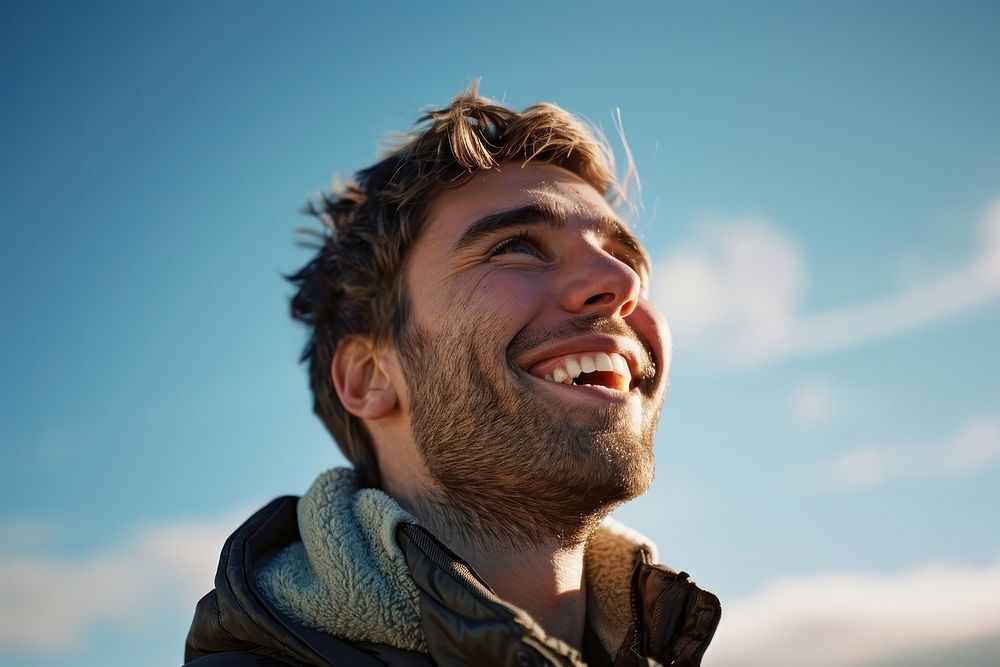 Smiling man laughs outside laughing adult smile. AI generated Image by rawpixel.