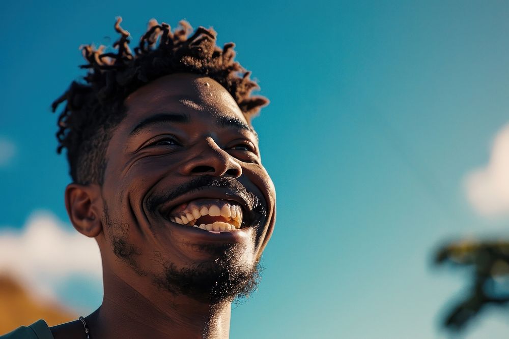 Smiling brazilan man laughs outside laughing adult smile. AI generated Image by rawpixel.