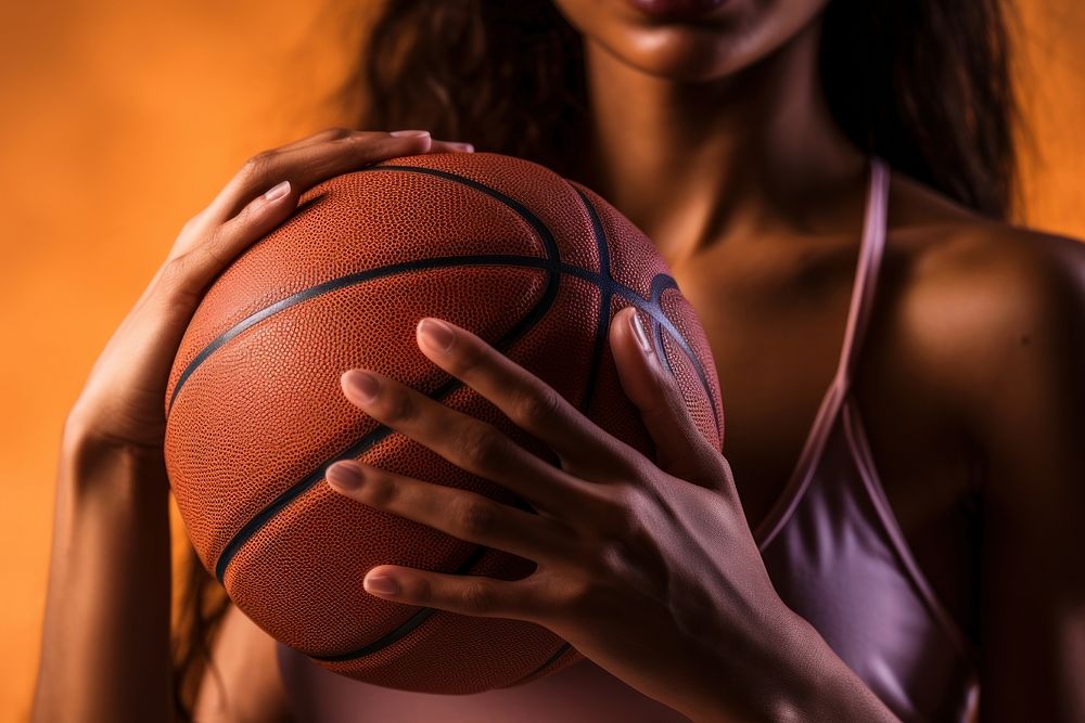Hand holding basketball sports motion basketball player. AI generated Image by rawpixel.