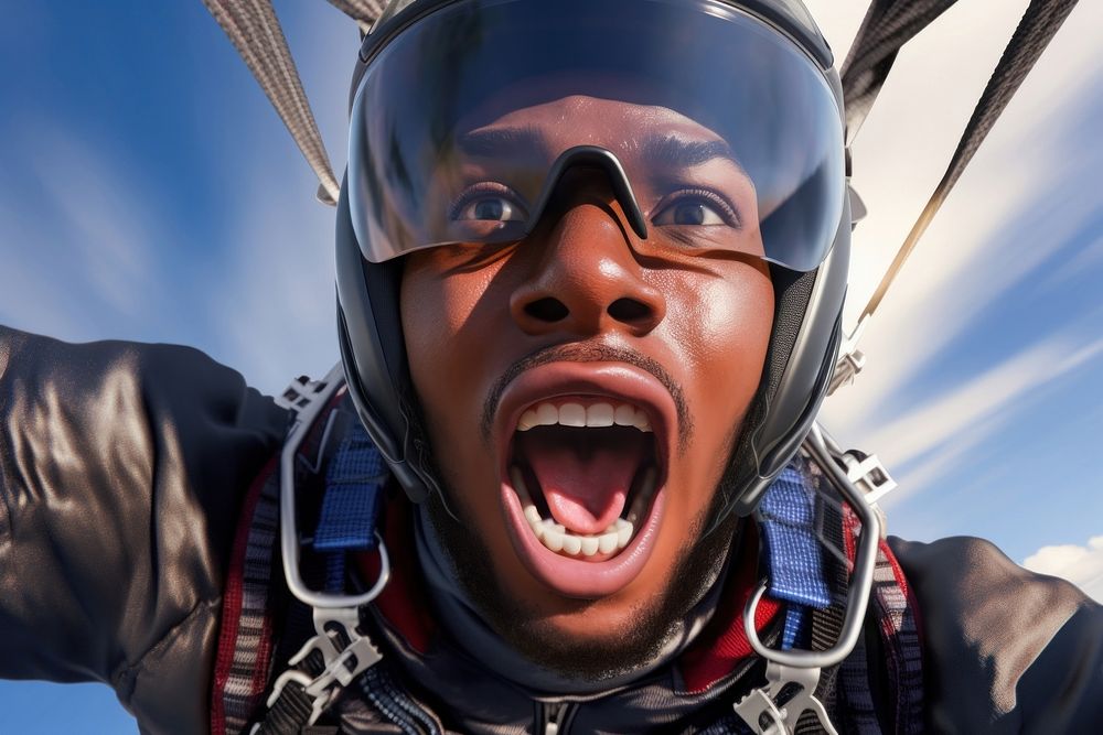 Black male playing sky dive shouting motion helmet. AI generated Image by rawpixel.