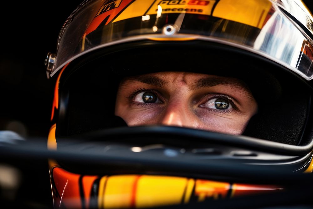 Male Automobile racing in race track helmet face protection. 