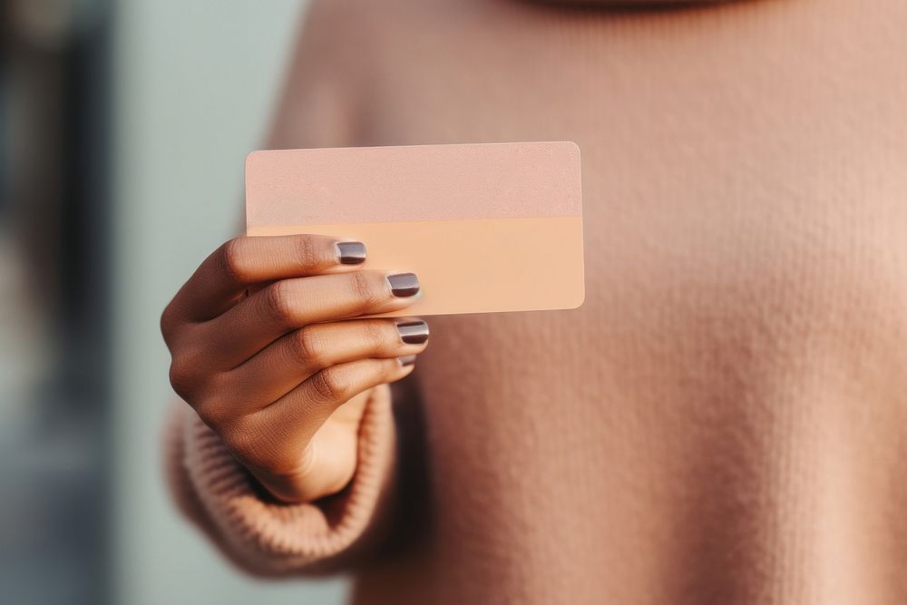 Credit card holding hand document. AI generated Image by rawpixel.