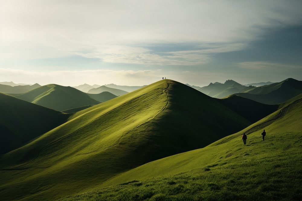 Two people hiking grass hill landscape. AI generated Image by rawpixel.