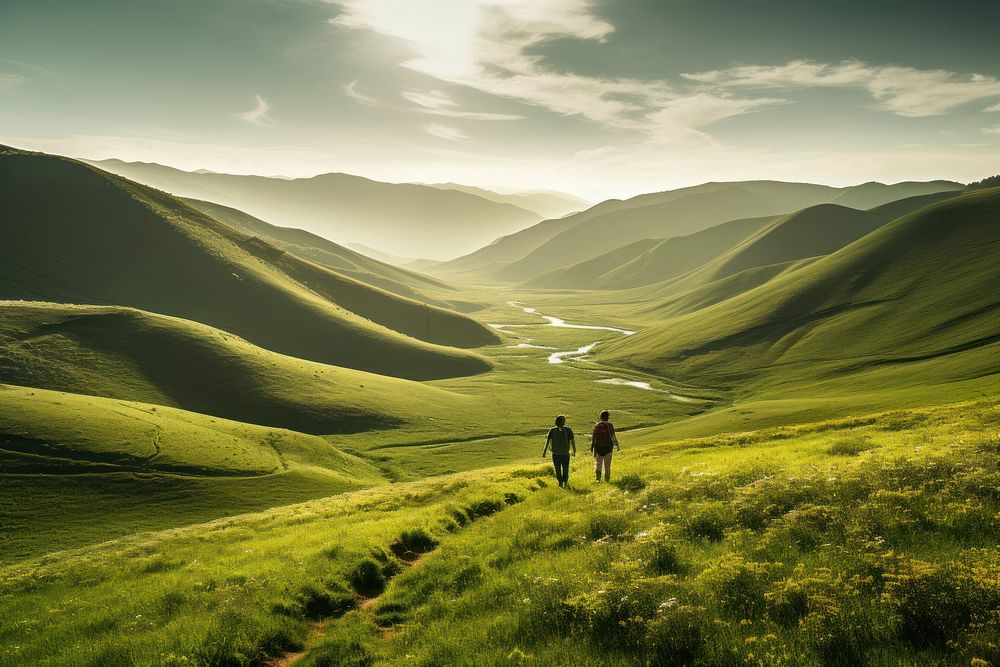 Two people hiking grass landscape grassland. AI generated Image by rawpixel.