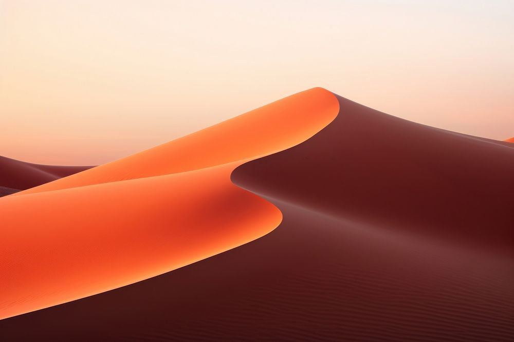The dunes at sunset on the desert nature landscape outdoors. AI generated Image by rawpixel.