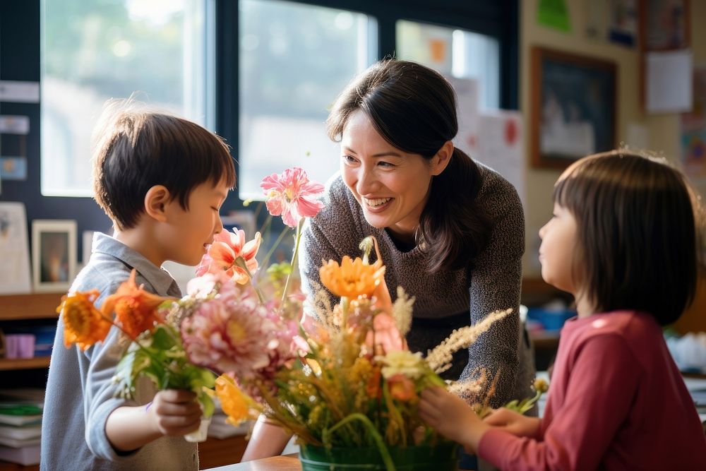 Asian teacher flower student adult. AI generated Image by rawpixel.