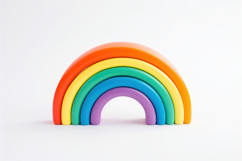 A rainbow toy white background simplicity. AI generated Image by rawpixel.