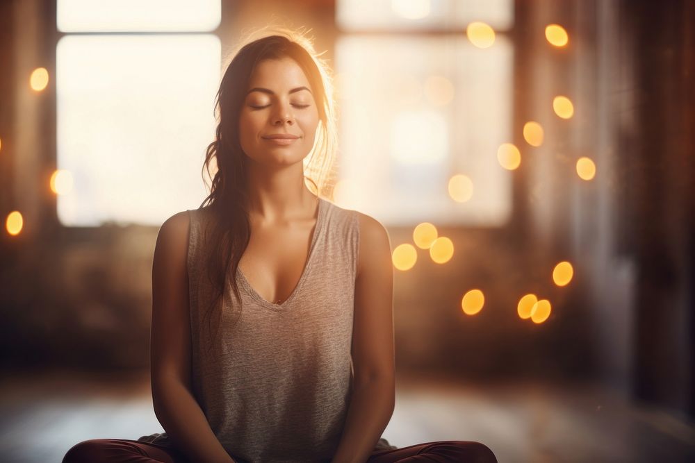 A woman attending yoga class sitting adult happy. AI generated Image by rawpixel.