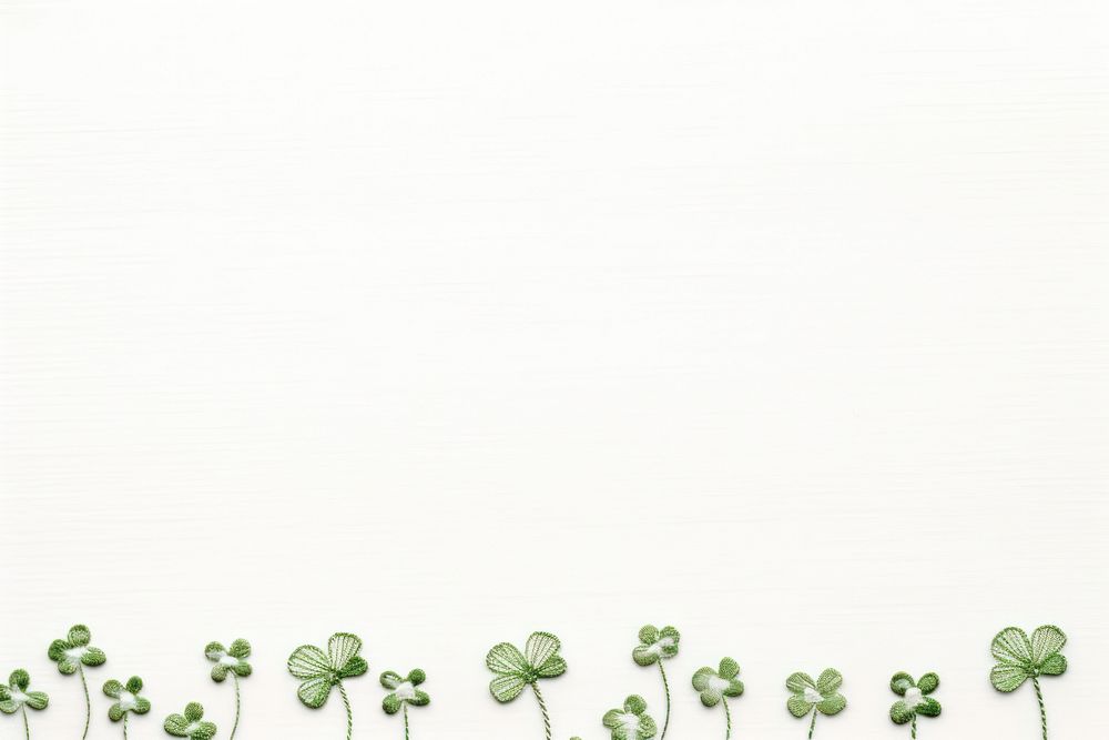 Upper frame border with little lucky clover pattern backgrounds green. AI generated Image by rawpixel.