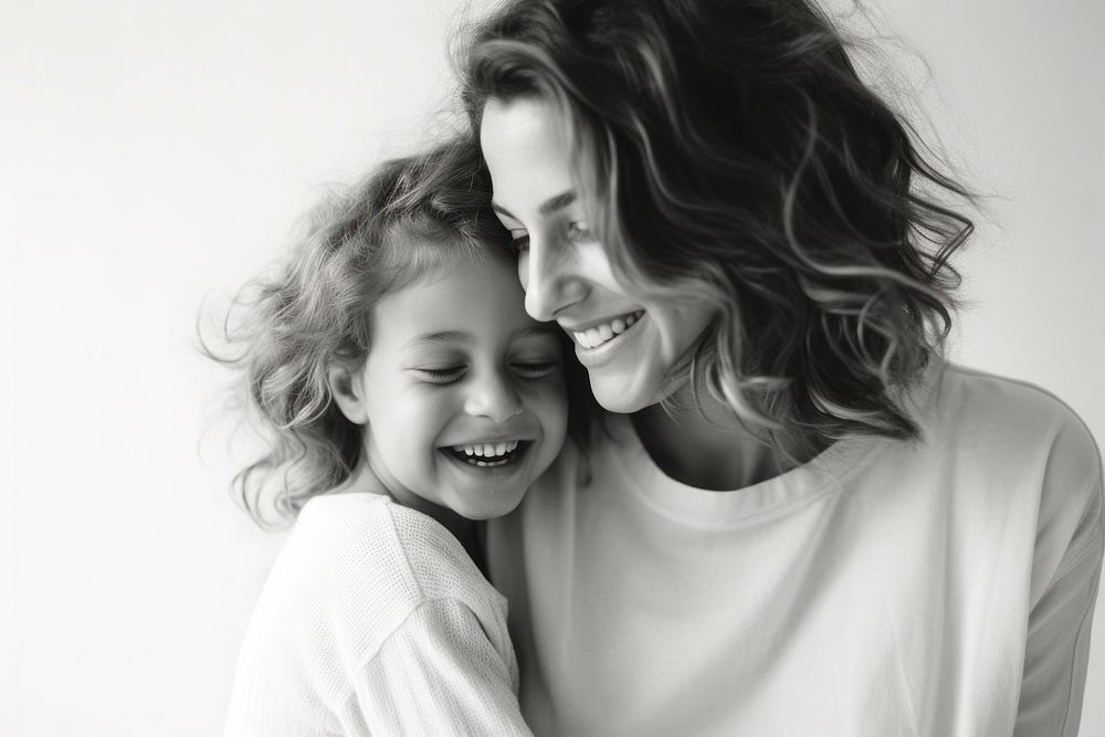 Smiling daughter hug cuddle mother laughing portrait child. AI generated Image by rawpixel.